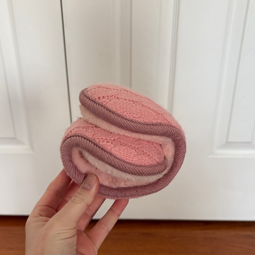 Pink earmuffs.